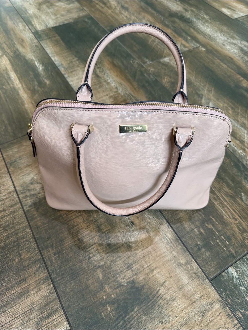 kate spade light pink leather satchel with gold-tone logo